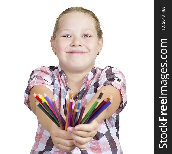 Girl with colored pencils on white background