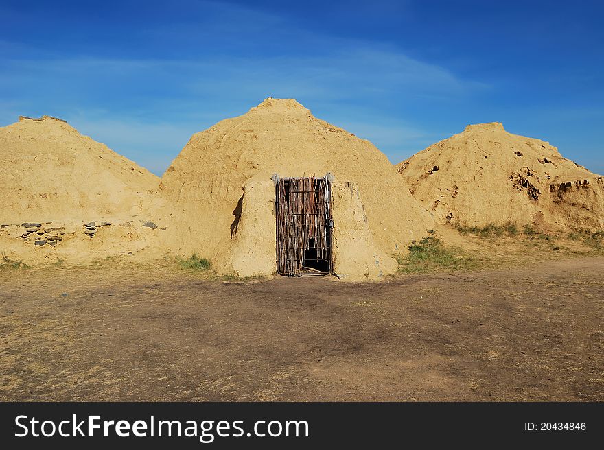 Reconstruction of ancient construction in steppe. Arkaim