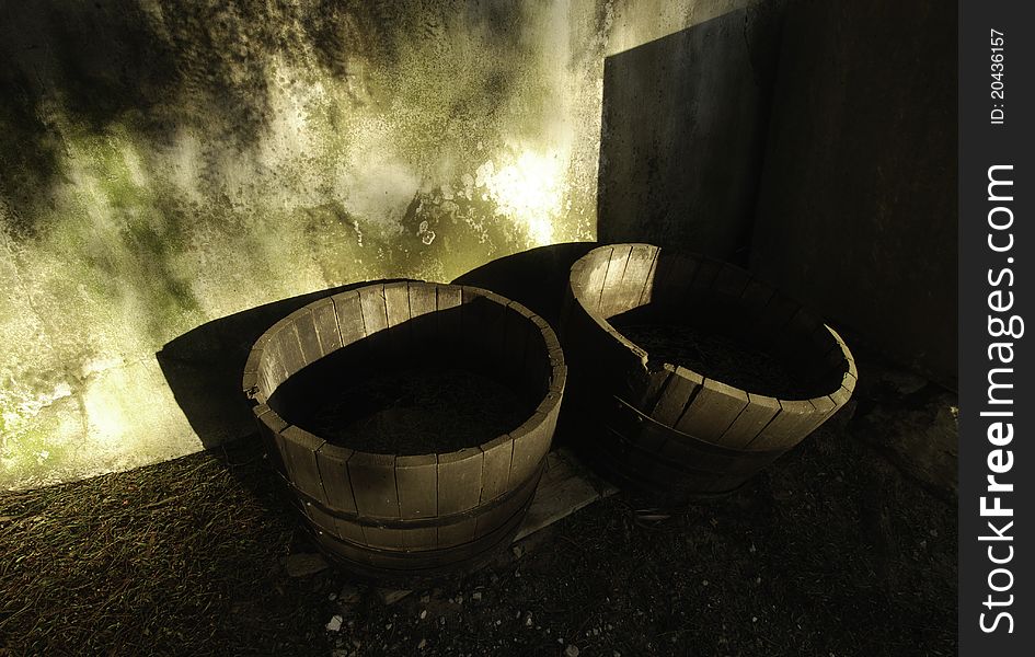 Old discarded wine barrels on a farm, west coast, South Africa.