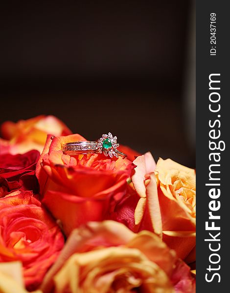 Wedding Rings on Bouquet - Roses