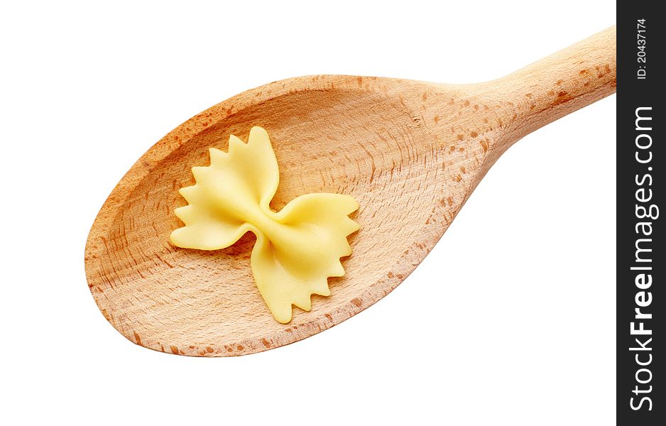 Bowtie pasta on a wooden spoon, tasting - cut out on white