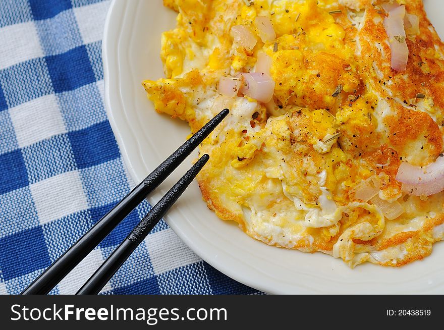 Asian style fried eggs with spicy seasonings. Asian style fried eggs with spicy seasonings.