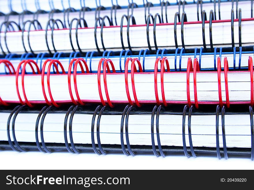 Copybook stack isolated on white background.