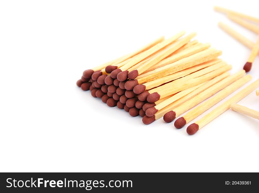 Pile of matches on white background.