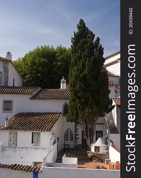 White houses and tiled roofs of Obidos, Portugal. White houses and tiled roofs of Obidos, Portugal