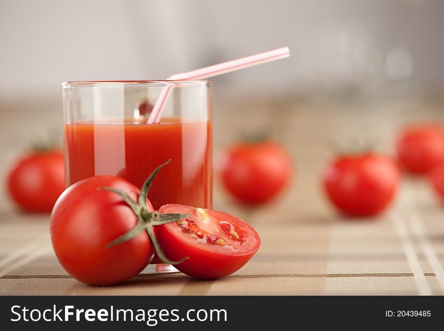 Fresh red tomato with juice