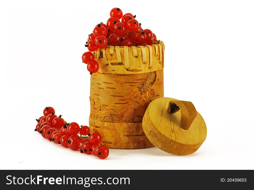 Red currants in bark basket ,isolated  white. Red currants in bark basket ,isolated  white.