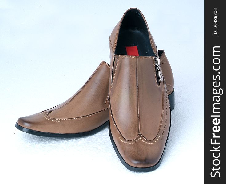 Man's leather shoes photoed in the studio with white background. Man's leather shoes photoed in the studio with white background.