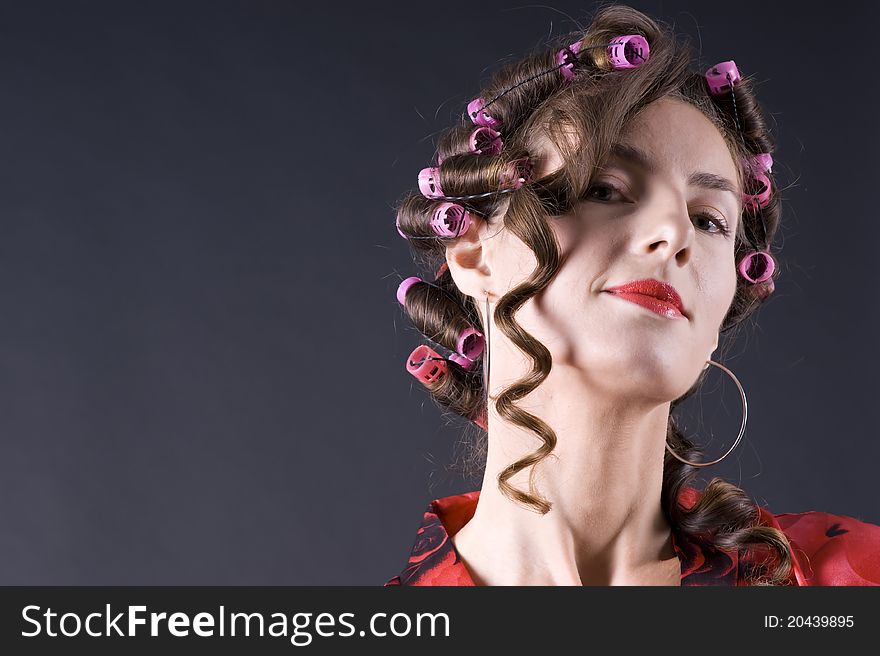 Beautiful Young Woman With Bigoudi On The Hair