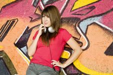 Girl With Headphones And Graffiti Wall Royalty Free Stock Photography Girl With Headphones And Graffiti Wall Royalty Free Stock Photography