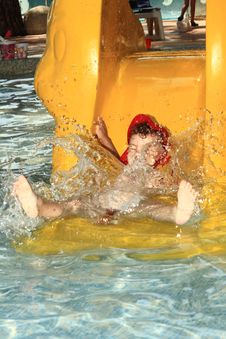 Child On Water Slide Royalty Free Stock Images Child On Water Slide Royalty Free Stock Images