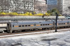 Commuter Train In Downtown Area Leaving Statio Royalty Free Stock Photography Commuter Train In Downtown Area Leaving Statio Royalty Free Stock Photography