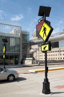 Pedestrian Crossing Sign In A Downtown Area Royalty Free Stock Photography Pedestrian Crossing Sign In A Downtown Area Royalty Free Stock Photography