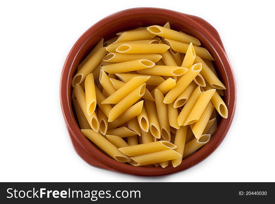 Italian pasta mezzemaniche cooking in kitchen