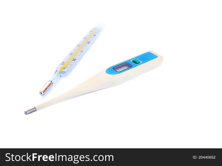 Medical thermometers on white background.