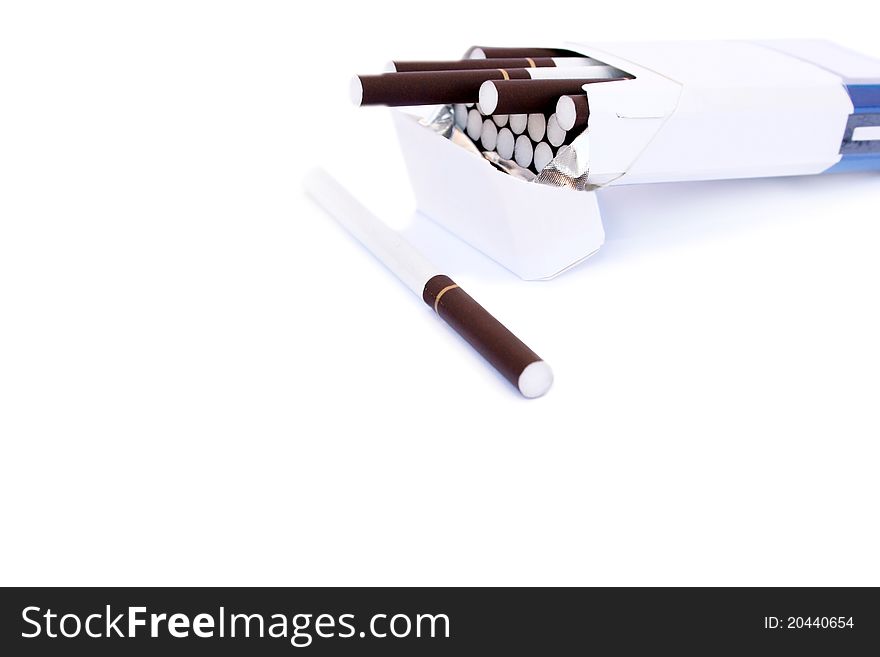 Open full pack cigarettes  on white background.