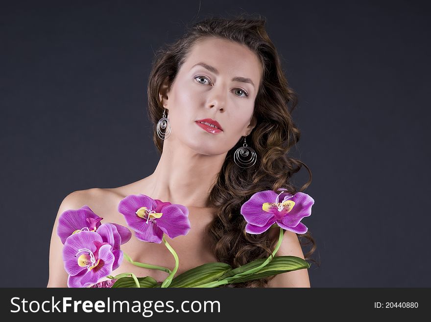 Beautiful young woman with long wavy hair