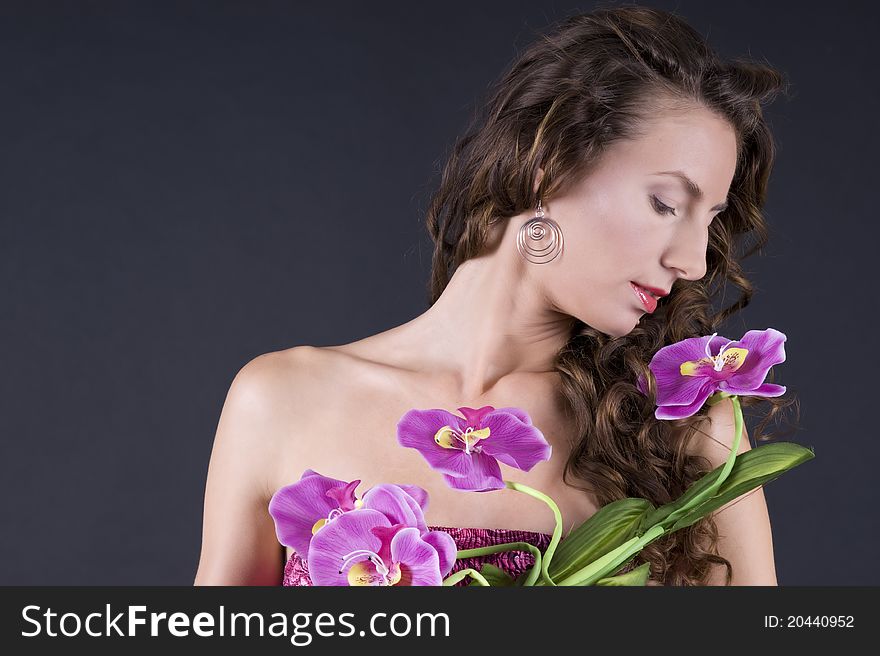 Beautiful young woman with long wavy hair