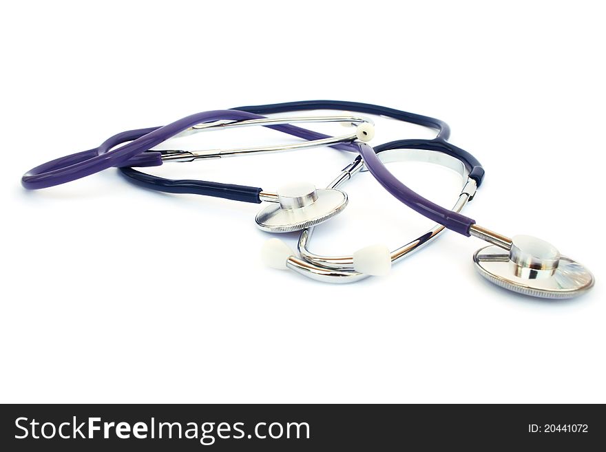 Two phonendoscopes  on white background.