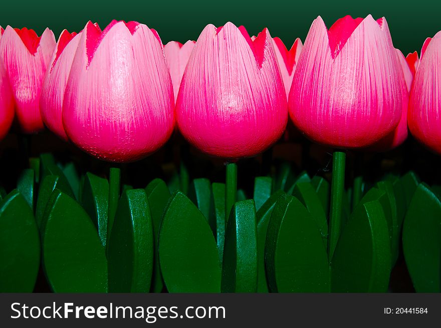 Set of pink wooden tulip ornaments. Set of pink wooden tulip ornaments.