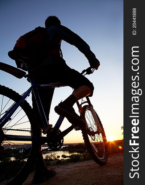Silhouette of bicycle look on summer sunrise. Silhouette of bicycle look on summer sunrise