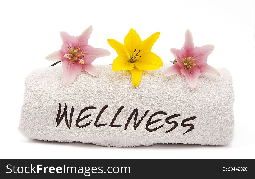 Lily and towel on a white background