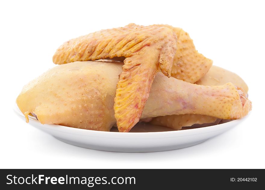 Raw chicken on white background