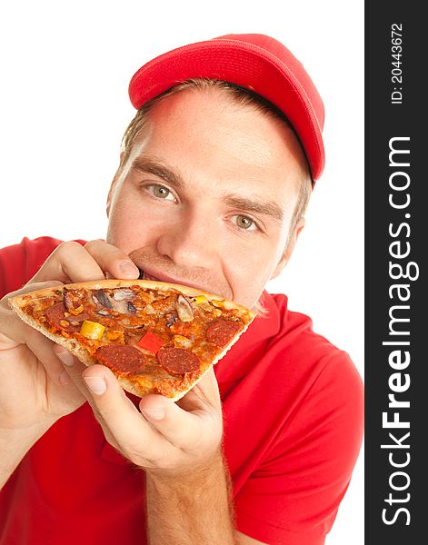 Eating a pizza isolated on white