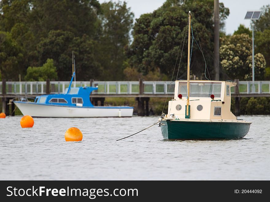 Old fishing boats in a harbour with selective focus