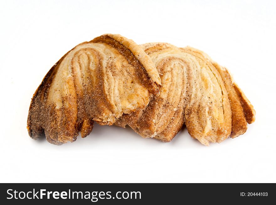 Cinnamon bun isolated on a white background