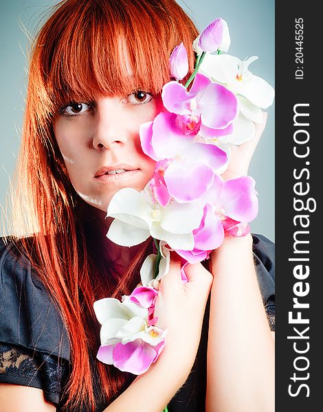 Beautiful Woman with Orchid flower