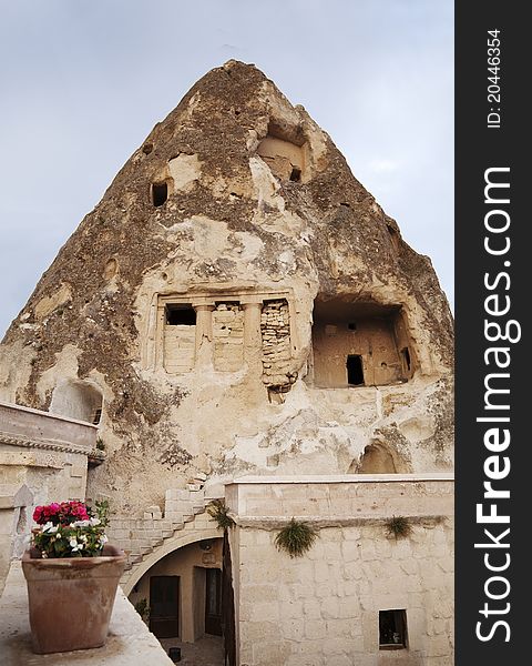 Portrait of a Goreme man made cave from natural weathered limestone and sandstone, copy space. Portrait of a Goreme man made cave from natural weathered limestone and sandstone, copy space