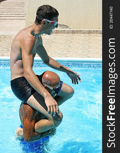 Men In Swimming Pool