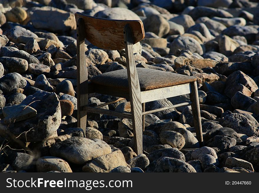 When arriving at a cottage in cape chin ontario i noticed this lonely chair on the rocky shore facing the water. it felt so lonely to be and yet also so peaceful with it facing the water i could just picture someone sitting there looking out enjoying the calm waters. When arriving at a cottage in cape chin ontario i noticed this lonely chair on the rocky shore facing the water. it felt so lonely to be and yet also so peaceful with it facing the water i could just picture someone sitting there looking out enjoying the calm waters.