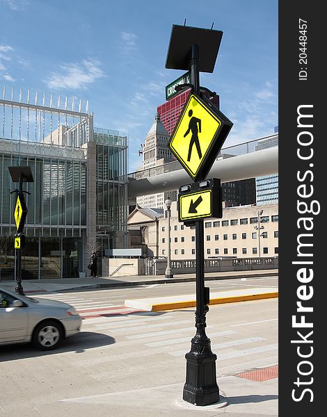 Pedestrian Crossing Sign In A Downtown Area