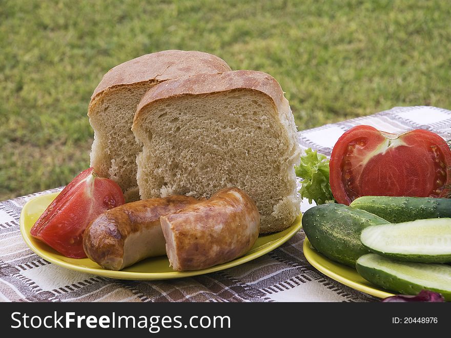 Summer dinner on table in garden