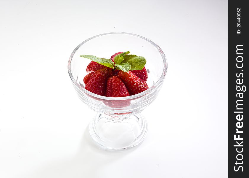Fresh appetizer red strawberry on the white background. Fresh appetizer red strawberry on the white background