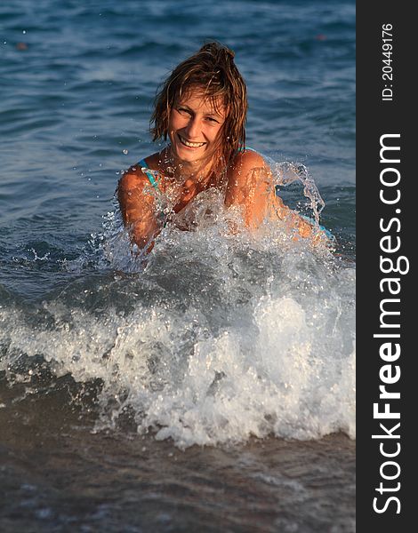 Girl having fun in the sea. Girl having fun in the sea