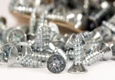 Wood Screws Spilling Out Of Box Royalty Free Stock Photography