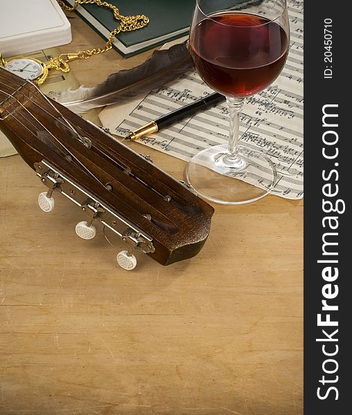 Guitar, Glass Of Wine And Note