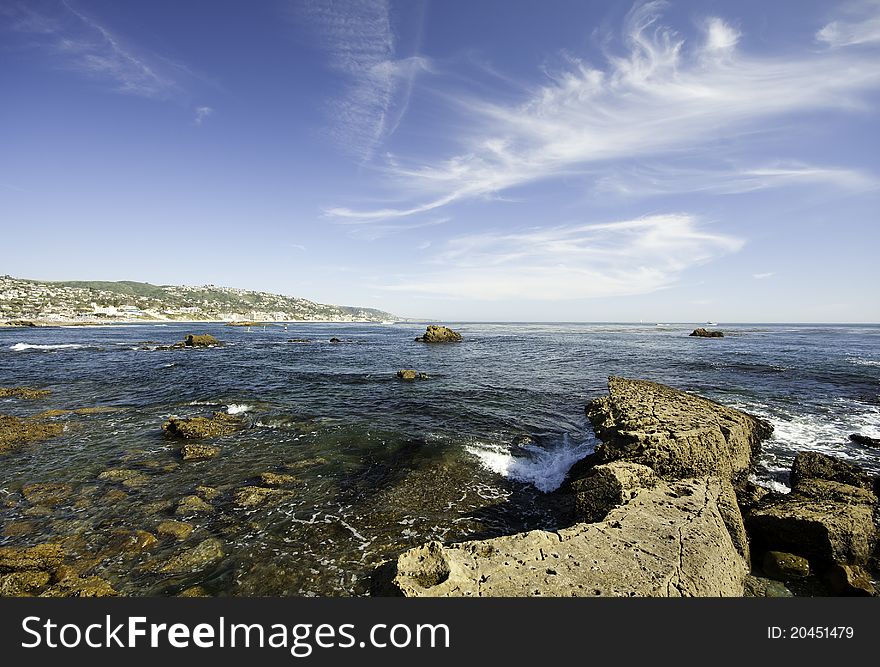 Rock beach at Laguna beach, CA, US in sunny day and blue sky