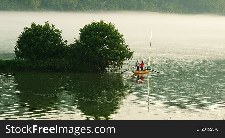 The morning mist over the Fuchun River in southern China. The morning mist over the Fuchun River in southern China