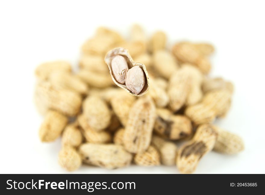 Close up peanuts with white background.