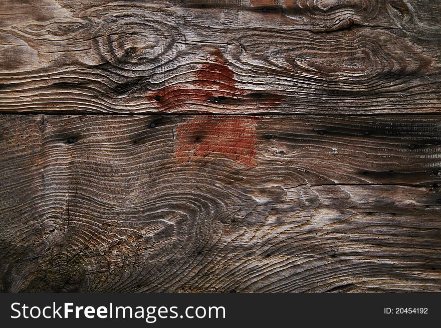 Red star painted on the wooden wall of the building