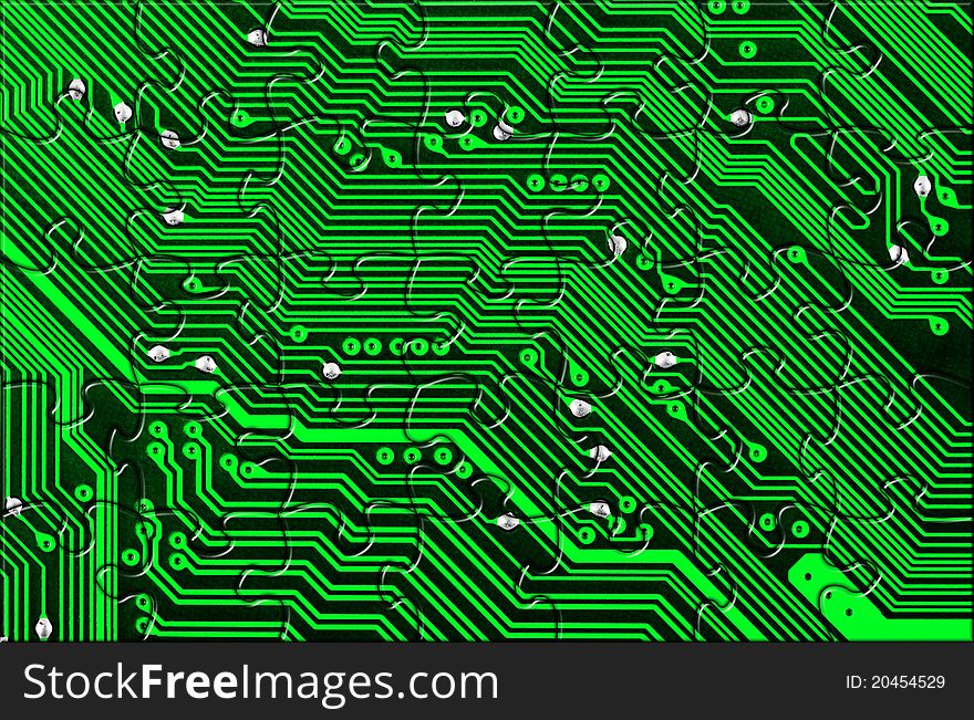 Computer board made of puzzle - technology concept background