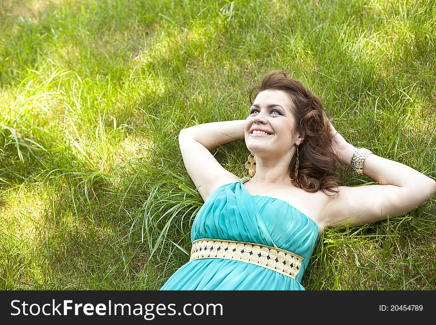 Extraordinarily beautiful girl in a blue dress