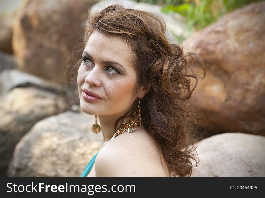 Extraordinarily beautiful girl in a blue dress