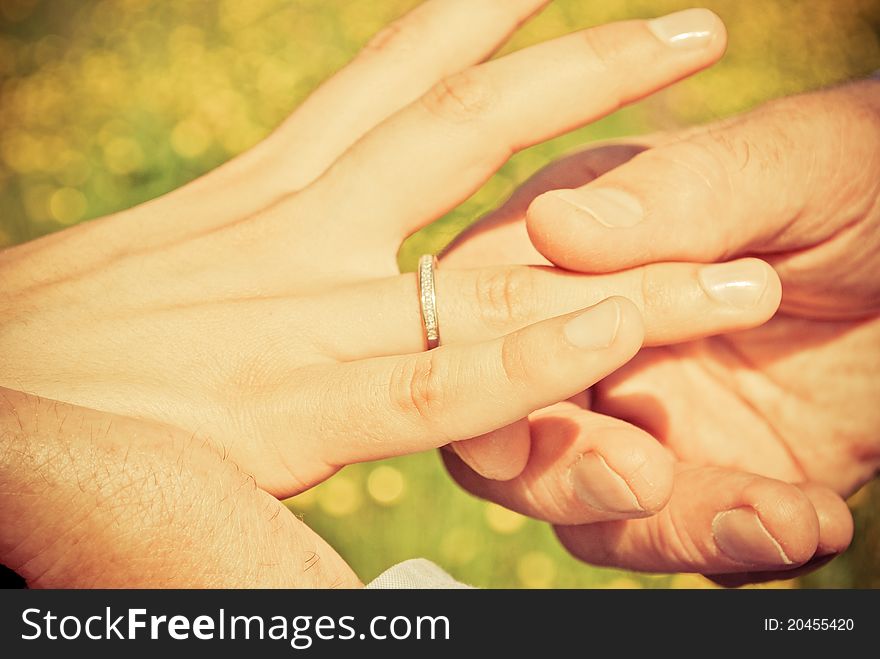 The moment of exchanging the wedding bands