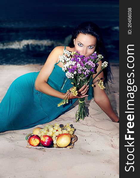 Portrait of a beautiful woman  on the beach