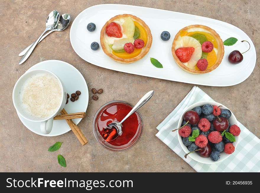 Fruit cakes with fresh coffee. Fruit cakes with fresh coffee